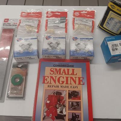 Small engine repair book with brand new car parts - U joints - Piston Ring Compressor - Trim panel retainers and more