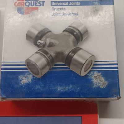 Small engine repair book with brand new car parts - U joints - Piston Ring Compressor - Trim panel retainers and more