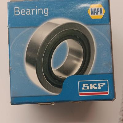 Small engine repair book with brand new car parts - U joints - Piston Ring Compressor - Trim panel retainers and more