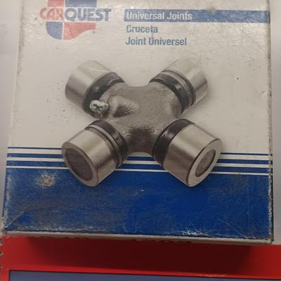 Small engine repair book with brand new car parts - U joints - Piston Ring Compressor - Trim panel retainers and more