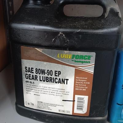 Partially full & mostly full automotive lubricants and a gas container