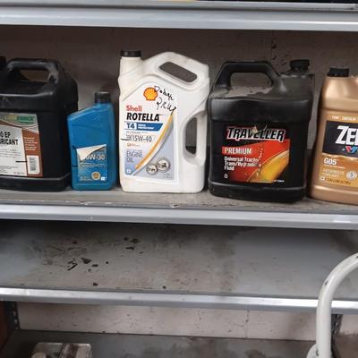 Partially full & mostly full automotive lubricants and a gas container