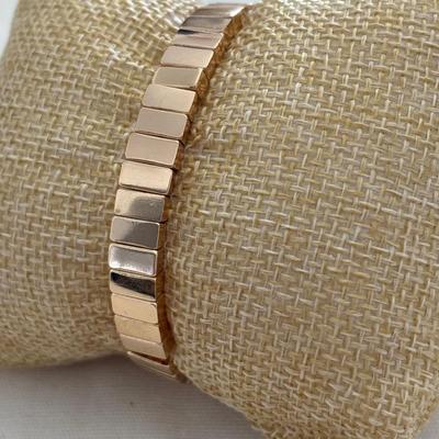 Gold tone, stretchy bracelet
