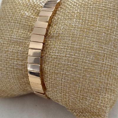 Gold tone, stretchy bracelet