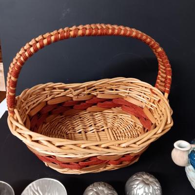 Antique aluminum Jello molds - ceramic rooster tea pot - and a decorative basket