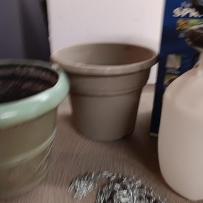 Plastic flowerpots - Weed sprayers - and small chain