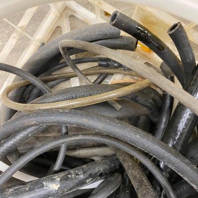 5 Gallon Yellow Fuel Can, Several Hose Remnants, drain pan and large warn Tarp