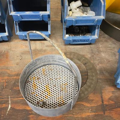 Organizing bins with a large variety of fasteners and other miscellaneous items
