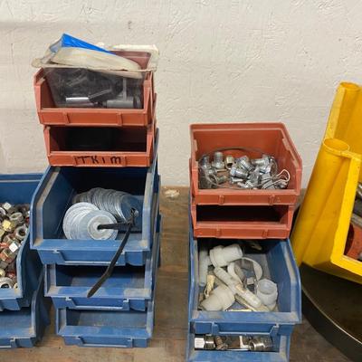 Organizing bins with a large variety of fasteners and other miscellaneous items