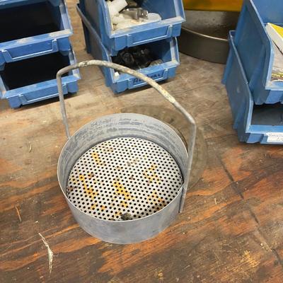 Organizing bins with a large variety of fasteners and other miscellaneous items