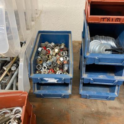 Organizing bins with a large variety of fasteners and other miscellaneous items