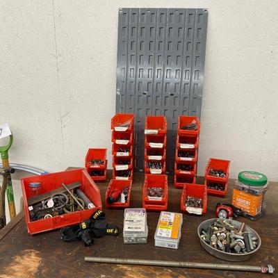 Wall organizer bins full of hardware and more!