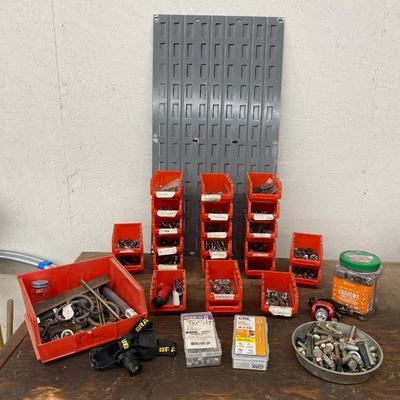 Wall organizer bins full of hardware and more!