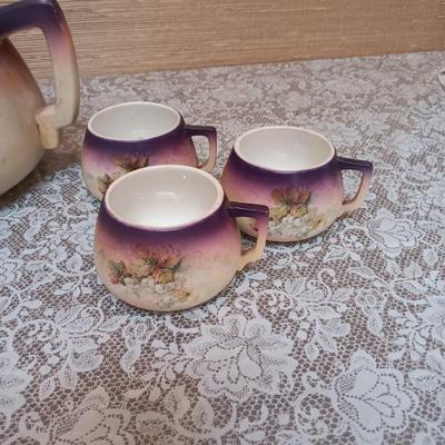 VINTAGE HANDPAINTED PORCELAIN TEAPOT AND CUPS