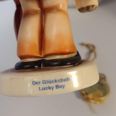 Pair of Hummel Figurines- 'Lucky Boy' and 'Gift from a Friend'