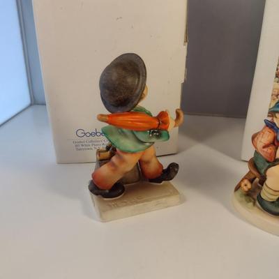 Pair of Hummel Figurines- 'Little Nurse' and 'Merry Wanderer'