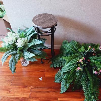 FAUX PLANTS AND A MARBLE TOP PLANT STAND