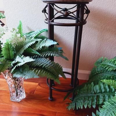 FAUX PLANTS AND A MARBLE TOP PLANT STAND