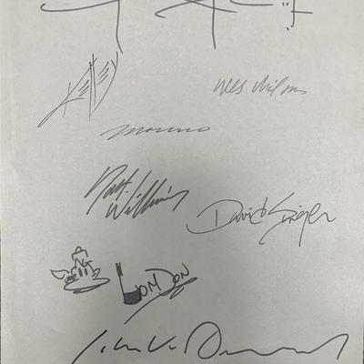 Various artists signed page