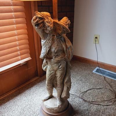 LARGE FIGURAL LAMP A MAN CARRYING WHEAT