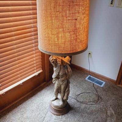 LARGE FIGURAL LAMP A MAN CARRYING WHEAT