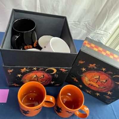 Box of Halloween mugs