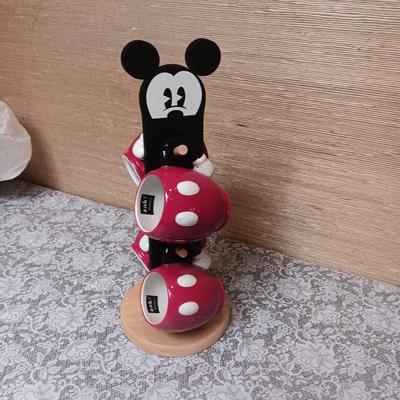 MICKEY MOUSE 4 MUGS AND A WOODEN PEGGED HOLDER