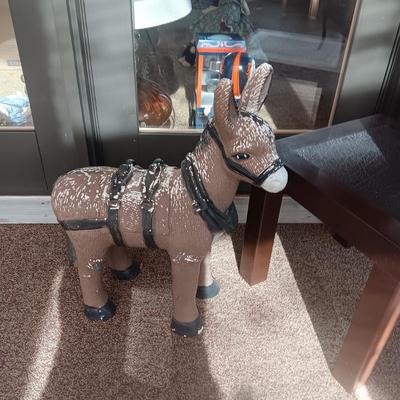 CERAMIC DONKEY YARD ART, 2 IRON PLANT STANDS AND A PLASTIC PATIO TABLE