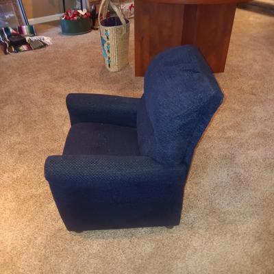 A CHILD'S NAVY BLUE RECLINER AND FRAMED PICTURE