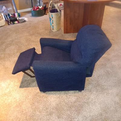 A CHILD'S NAVY BLUE RECLINER AND FRAMED PICTURE