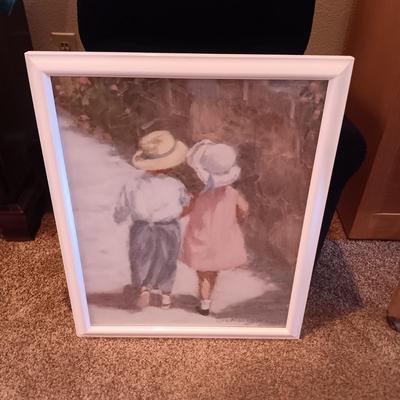 A CHILD'S NAVY BLUE RECLINER AND FRAMED PICTURE
