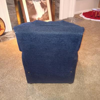 A CHILD'S NAVY BLUE RECLINER AND FRAMED PICTURE