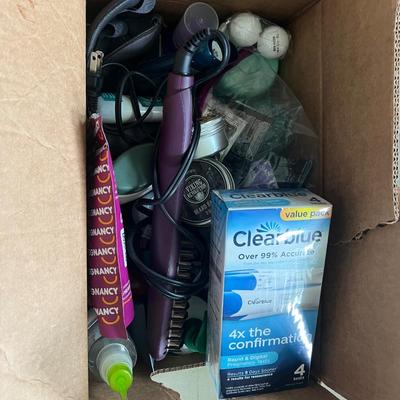 Box of bathroom supplies
