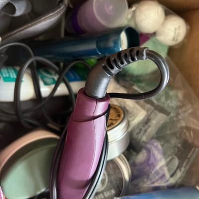 Box of bathroom supplies