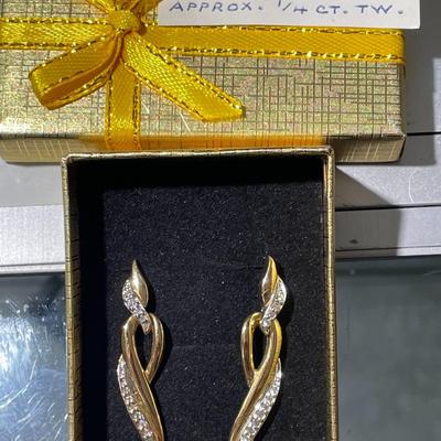 Ladies 14K 1/4 Carat TW Diamond Dangling Earrings 4-Pennyweights TW 1-5/8" Tall in Good Preowned Condition.