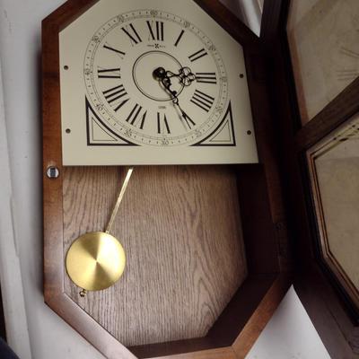 Howard Miller Battery Operated Wood Case Wall Clock