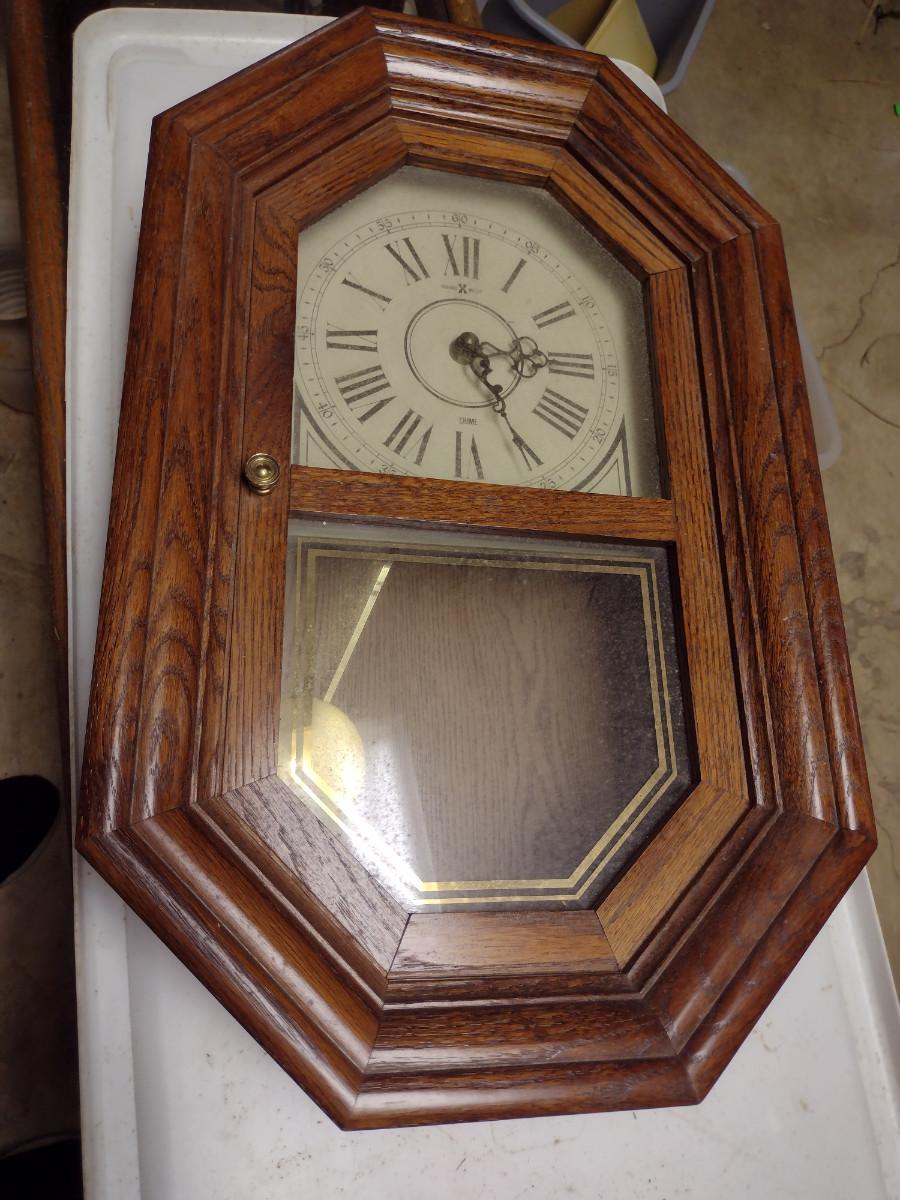 Howard Miller Battery Operated Wood Case Wall Clock