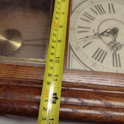 Howard Miller Battery Operated Wood Case Wall Clock