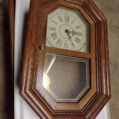 Howard Miller Battery Operated Wood Case Wall Clock