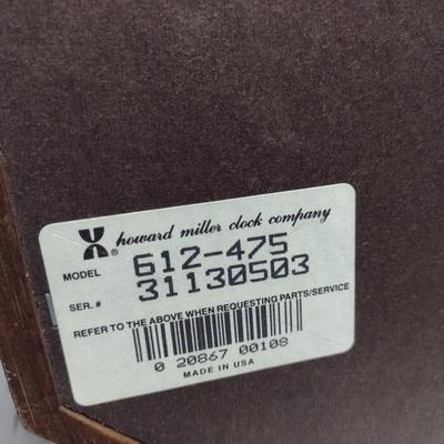 Howard Miller Battery Operated Wood Case Wall Clock