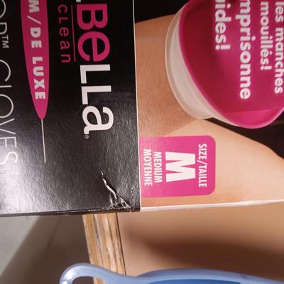 CLEANING SUPPLIES AND A LAUNDRY BASKET
