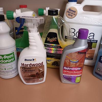 CLEANING SUPPLIES AND A LAUNDRY BASKET