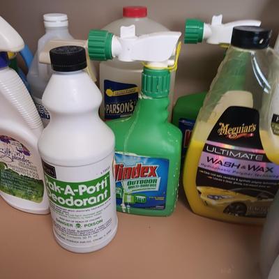 CLEANING SUPPLIES AND A LAUNDRY BASKET