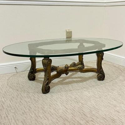 Oval Glass Coffee Table With Carved Wooden Base