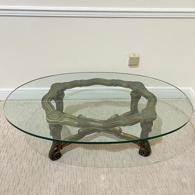 Oval Glass Coffee Table With Carved Wooden Base