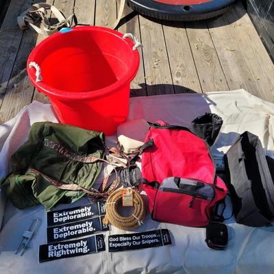 Lot of storage items, rope bumper stickers, canteen, tub