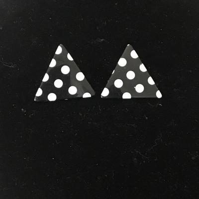 Black triangle earrings with white polka dots