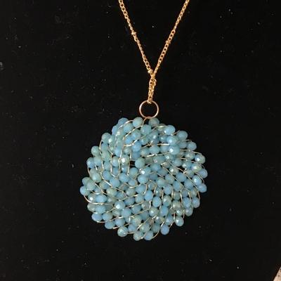 Beaded circle disc on long GT necklace