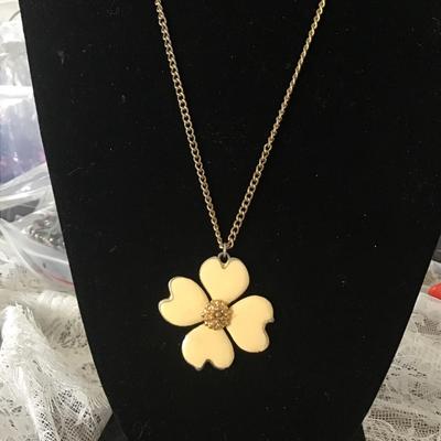 GT necklace with creme colored flower pendant