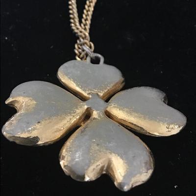 GT necklace with creme colored flower pendant